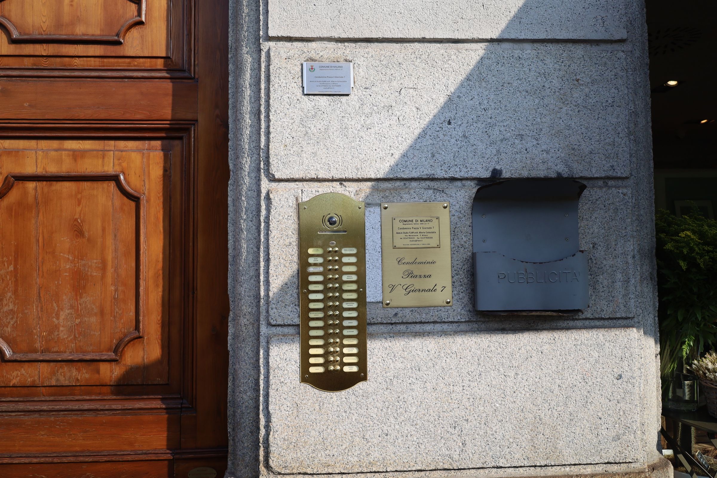 Brass mailboxes at the entrance of an office building in the Netherlands