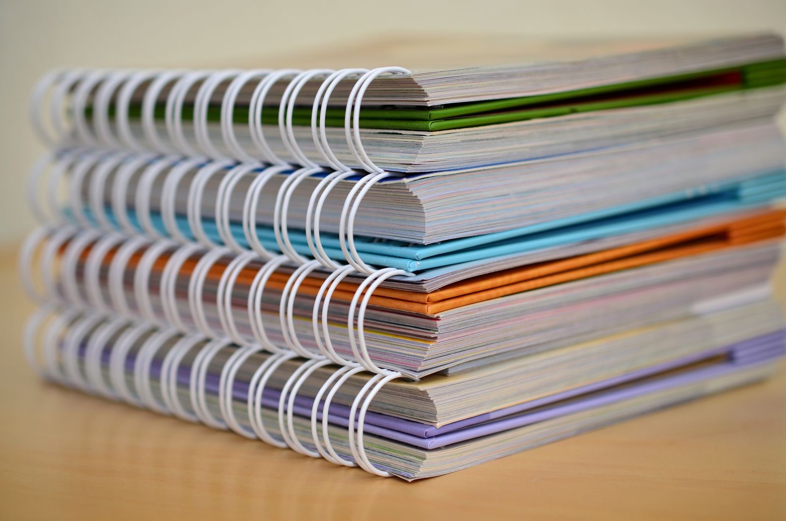 An application file being checked against a document list on an office desk